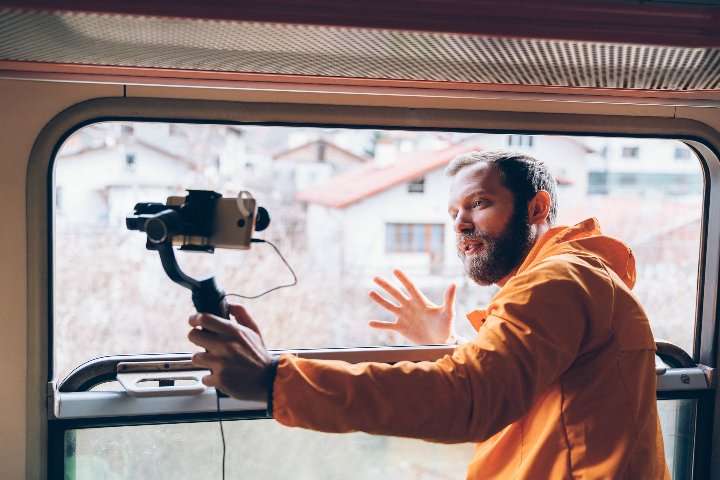 Influencer traveling in train and vlogging